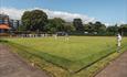 Some bowlers on the green.