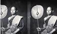 an old photograph taken by John Thompson of two young guys
