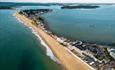 Beautiful birds eye view of a stretch of Sandbanks beach on a clear summers day in Poole