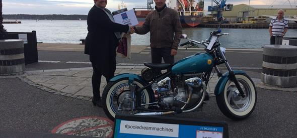 Bike Winner pictured on Quay with judge.