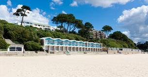Sandy beaches and two level beach huts at Poole 