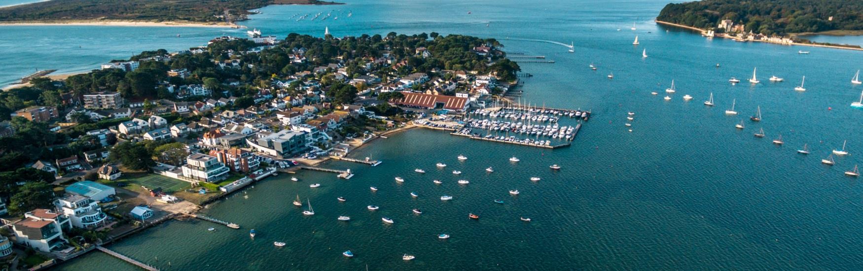 Aerial shot of sanbanks with boats moored in the harbour