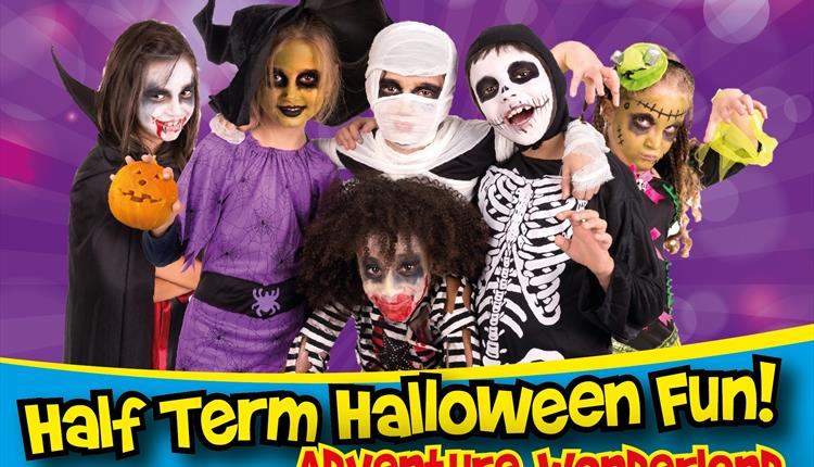 Poster with Half Term Halloween Fun Adventure Wonderland written on it with children dressed in halloween costumes