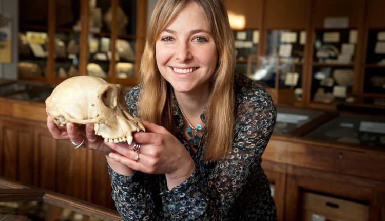 photo of Alice Roberts on tour with a skull