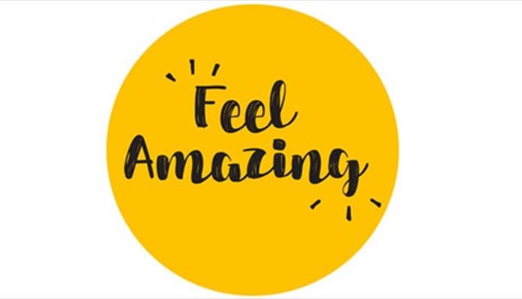 Yellow circle logo with Feel Amazing text
