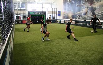 Men playing 5 a side football at FTY Lab