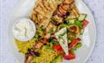 Lunch menu The Real Greek Bournemouth with a kebab, pitta, rice and salad