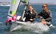 Two girls enjoying a chilled sail around Sandbanks and Poole harbour