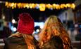 Two young girls looking at Chritmas lights in Poole