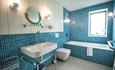 Blue bathroom interior.
