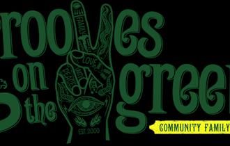 Words saying ' Grooves on the green' with a hand showing the peace sign