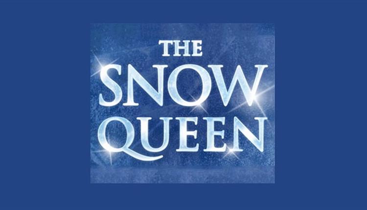 the snow queen icy text sparkling on a blue background.