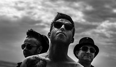 Black and white photograph of Depeche Mode tribute band The Devout