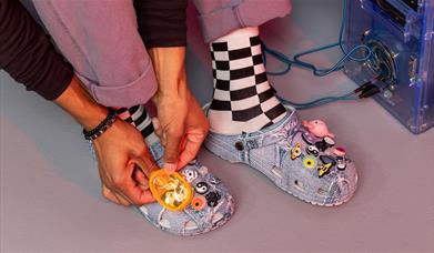 Personalised Crocs shoes with a denim-style design