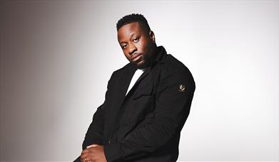 Press shot of Babatunde Aléshé for his latest stand-up tour: High Expectations