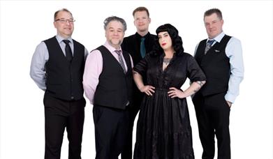 Press shot for Davina and the Vagabonds, featuring the five members of the band against a white background