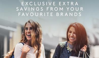 Two women shopping at Gunwharf Quays under the tagline: Exclusive extra savings from your favourite brands