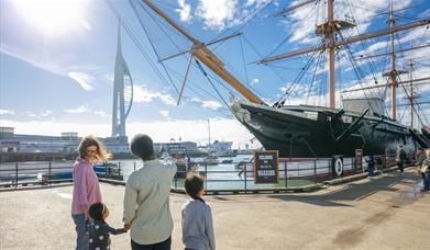 Family looking out at HMS Warrior