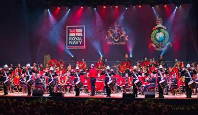 The Massed Bands of His Majesty's Royal Marines on stage at Portsmouth Guildhall