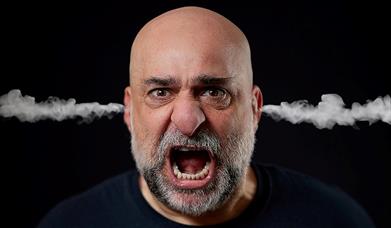 Poster for Omid Djalili - Namaste, featuring the comic with steam coming out of his ears