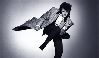Black and white picture of singer Paul Young from his 1980s