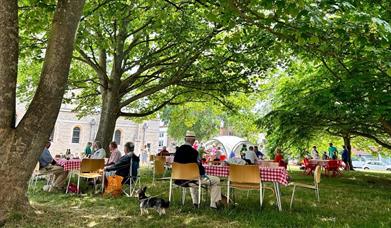 People enjoying Seafood On The Green at Portsmouth Cathedral
