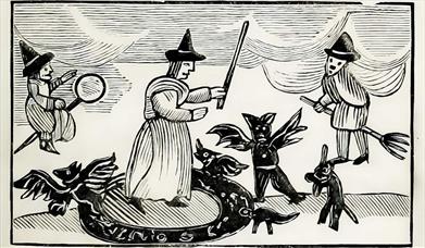 Wood carving of Tudor witches