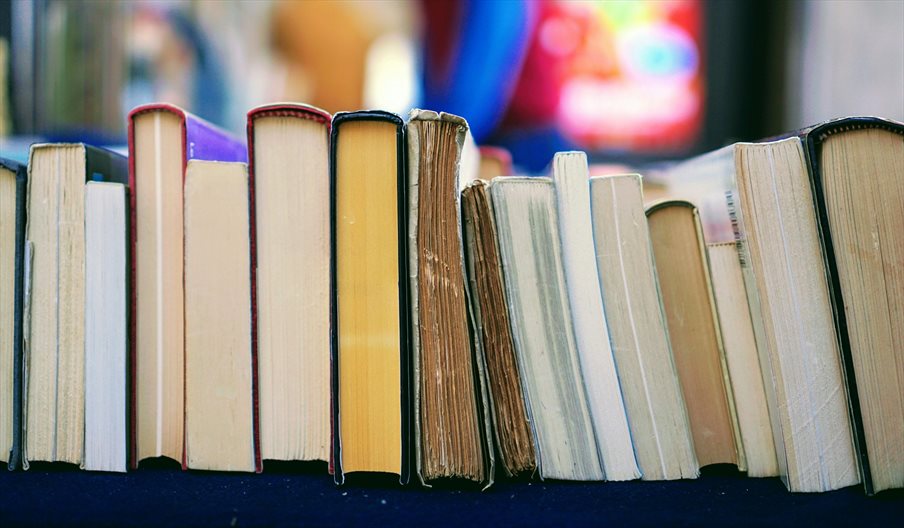 A stock image showing a stack of books