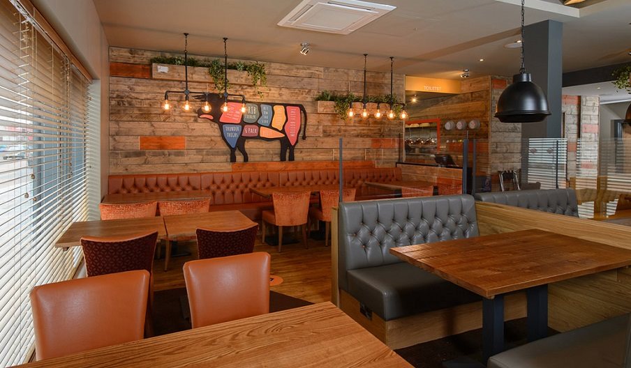 Interior of a Beefeater Restaurant, with tables for four