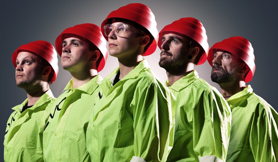 The five members of We Are Not Devo wearing the signature red hats