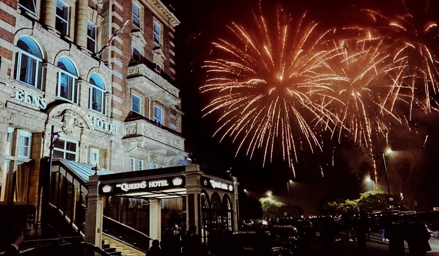 Fireworks going off outside the Queens Hotel for its New Year's Eve ball.