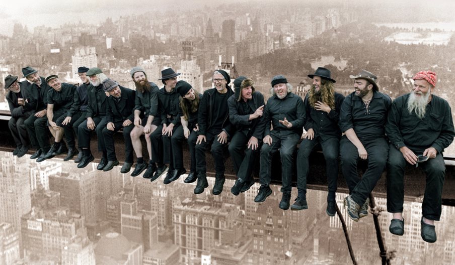 Photograph of the Spooky Men's Chorale, aping the famous New York Girder image