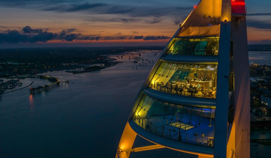 Aerial photograph of Spinnaker Tower by night