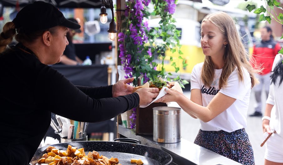 A girl ordering food at a Gunwharf Quays Street Food event