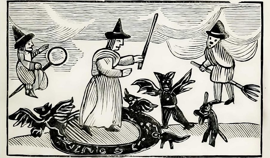 Wood carving of Tudor witches