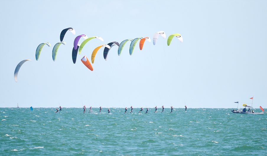 Kite surfing out in the Solent, photograph by Vernon Nash