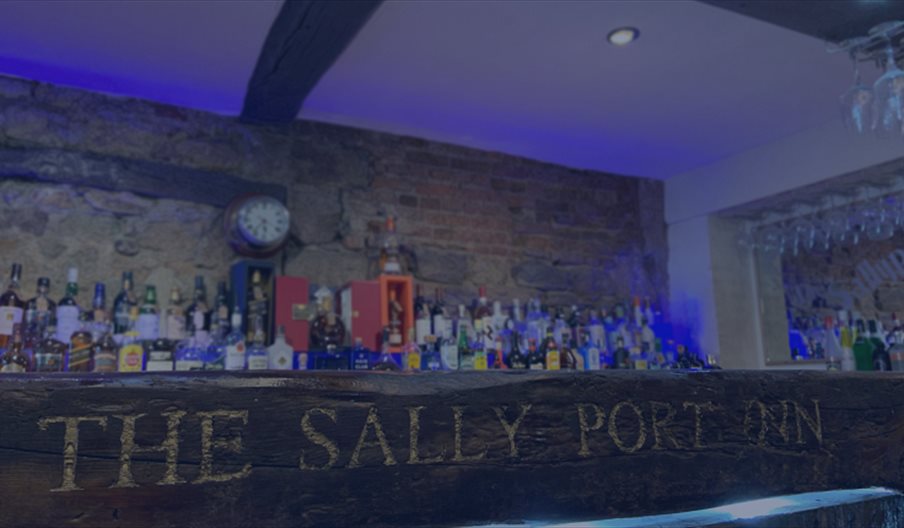 The well-stocked bar at the Sally Port Inn