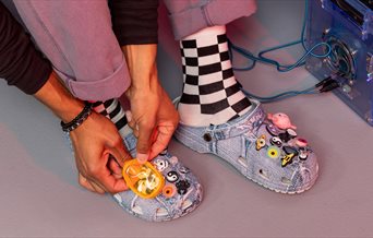 Personalised Crocs shoes with a denim-style design