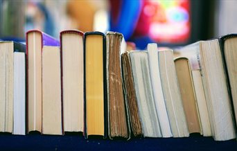 A stock image showing a stack of books