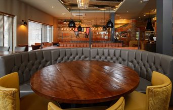 Circular booth at a Beefeater restaurant