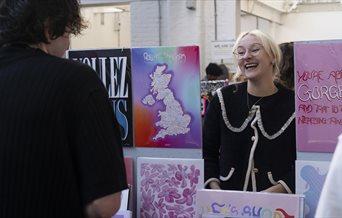 A trader and a punter at a 'Craft & Flea' Makers Market