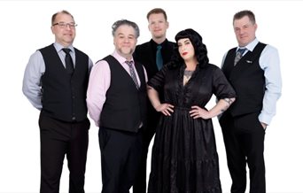 Press shot for Davina and the Vagabonds, featuring the five members of the band against a white background