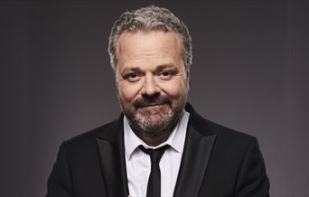 Photograph of Hal Cruttenden for his latest tour show: Can Dish it Out But Can't Take it