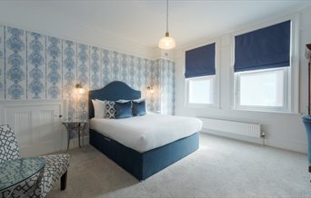 Blue and white tones in a double room at Florence Gardens Boutique Hotel and Restaurant