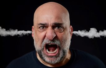 Poster for Omid Djalili - Namaste, featuring the comic with steam coming out of his ears
