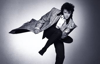 Black and white picture of singer Paul Young from his 1980s