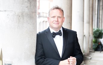 Photograph of Peter Auty in a tuxedo