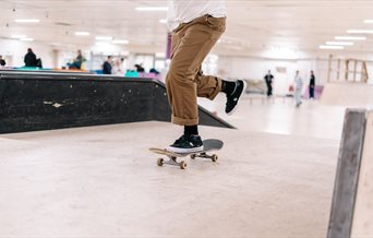 Photograph of a person skating a ramp at Pitt St. Skatepark in Portsmouth