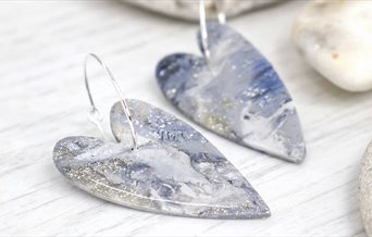 Photograph of 'Luna' earrings by Hotwalls Studios artist 26th of May