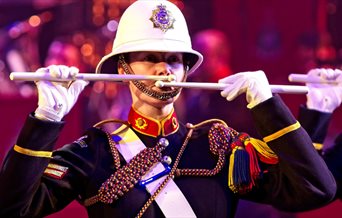 A drummer from The Royal Marines School of Music performs